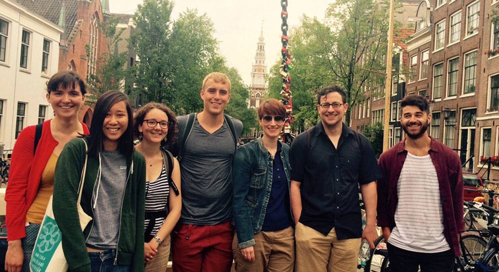  Group of people on free walking tour of Red Light District in Amsterdam​