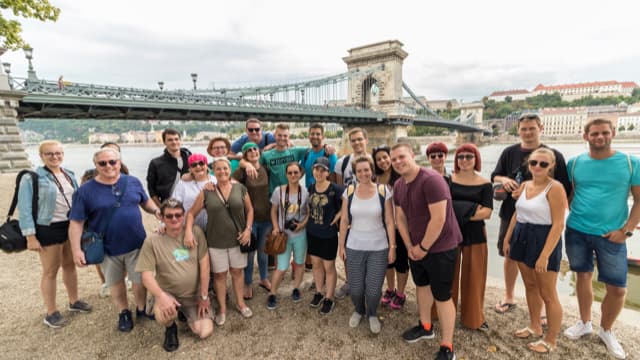 Happy Budapest tour group at the famous Chain Bridge.