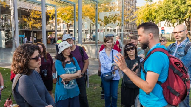 Our tour guide introduces visitors to local Jewish history