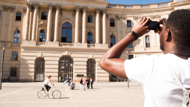 A participant captures the sight of Humboldt University on our Free tour of Berlin